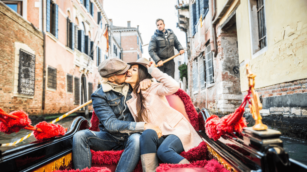 couple venice gondola venice canals 