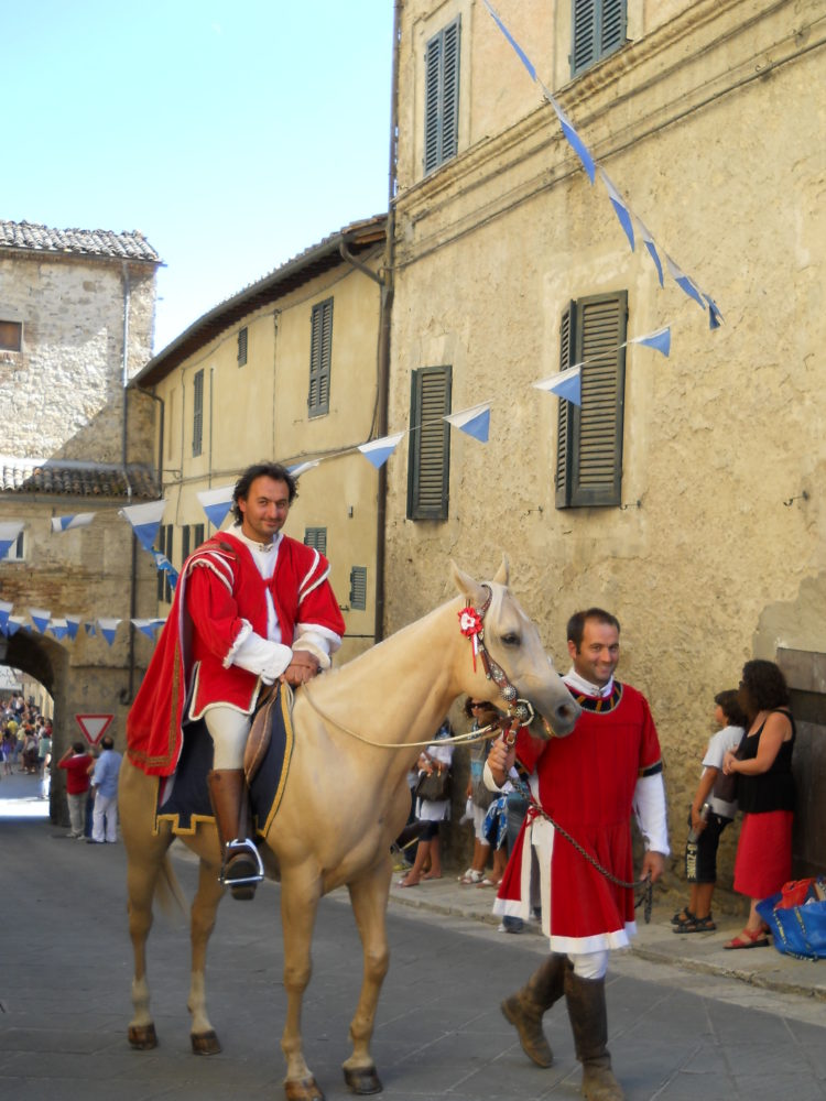 Sporting the Contrada colors at the Giostra del Saracino