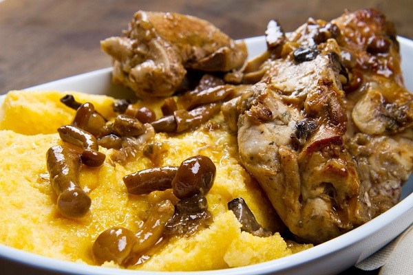 Italian Regional Food: Rabbit with mushrooms and polenta