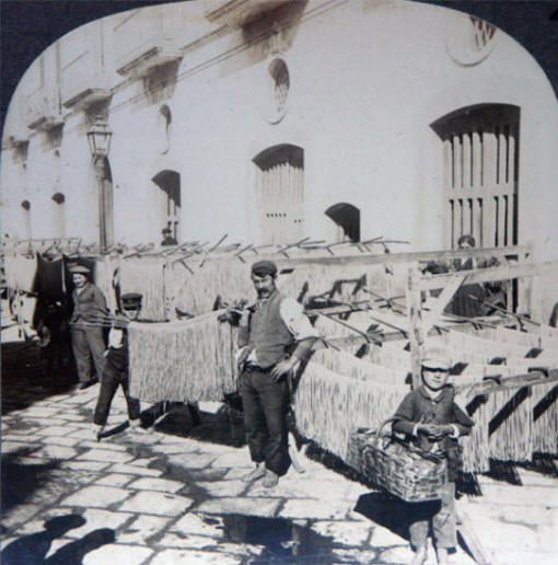 Spaghetti (at the time called macaroni) drying in the streets of Naples, circa 1895